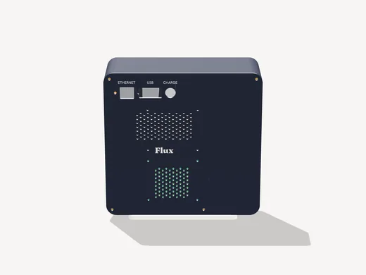 The back of Flux: a navy sheet with the Ethernet, USB and CHARGE ports along the top, two vent grilles and the Flux wordmark.
